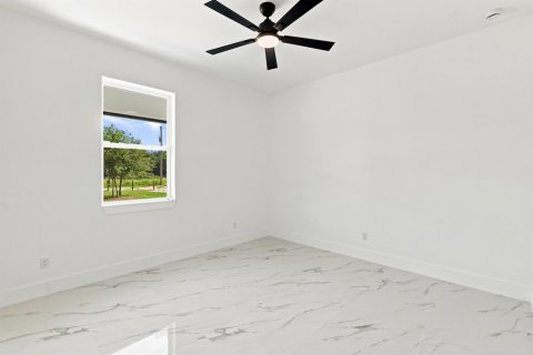House in Okeechobee, Florida 3 bedrooms, 130.06 sq.m. № 2192521 - photo 19