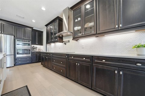Купить виллу или дом в Уэсли-Чепел, Флорида 12 комнат, 411.46м2, № 2097776 - фото 16