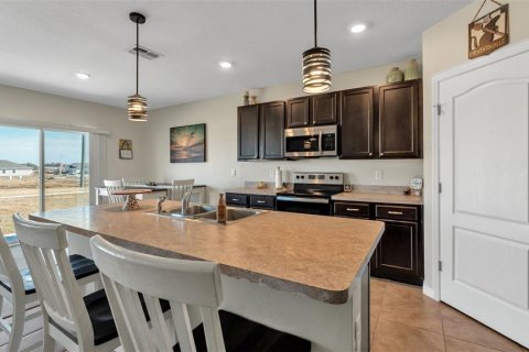 House in Lake Alfred, Florida 5 bedrooms, 248.42 sq.m. № 2112134 - photo 11