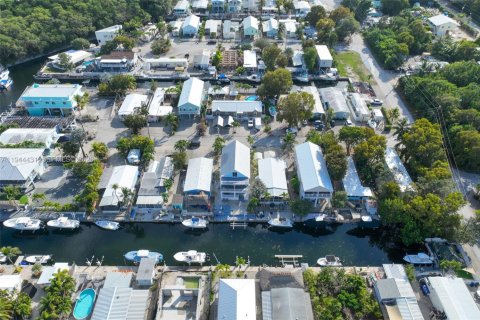 House in Key Largo, Florida 4 bedrooms, 166.11 sq.m. № 2002395 - photo 22