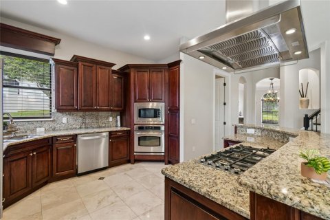 House in Clermont, Florida 5 bedrooms, 453.27 sq.m. № 2258464 - photo 7