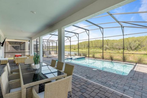 House in Kissimmee, Florida 8 bedrooms, 398.46 sq.m. № 2104178 - photo 11