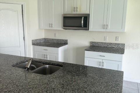 House in Kissimmee, Florida 5 bedrooms, 248.42 sq.m. № 2325188 - photo 6