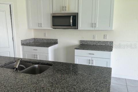 House in Kissimmee, Florida 5 bedrooms, 248.42 sq.m. № 2325188 - photo 5