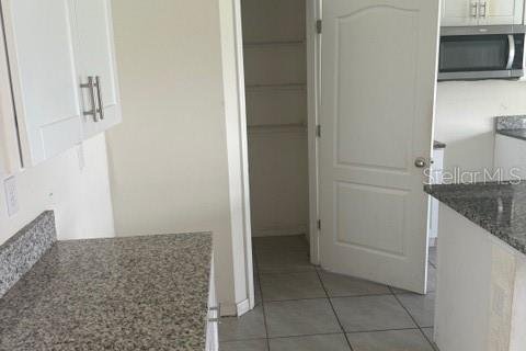 House in Kissimmee, Florida 5 bedrooms, 248.42 sq.m. № 2325188 - photo 4