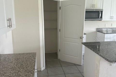 House in Kissimmee, Florida 5 bedrooms, 248.42 sq.m. № 2325188 - photo 3