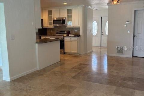 House in Treasure Island, Florida 4 bedrooms, 221.11 sq.m. № 2101719 - photo 22