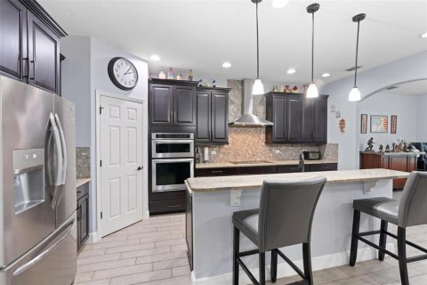 House in Davenport, Florida 4 bedrooms, 287.63 sq.m. № 2230439 - photo 11