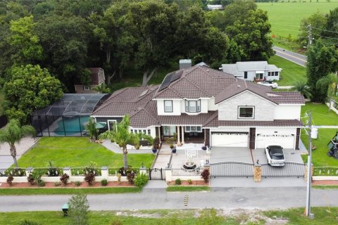 Купить виллу или дом в Окои, Флорида 12 комнат, 406.26м2, № 1746816 - фото 1