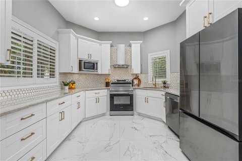 House in Ormond Beach, Florida 4 bedrooms, 406.82 sq.m. № 2224651 - photo 13
