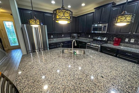 House in CONNERTON

 in Land O' Lakes, Florida 4 bedrooms, 212.19 sq.m. № 1876616 - photo 9