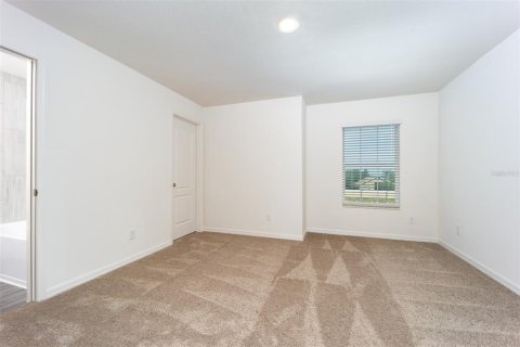 Townhouse in Dundee, Florida 2 bedrooms, 146.23 sq.m. № 2215297 - photo 13