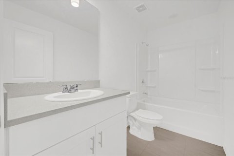 Снять в аренду таунхаус в Киссимми, Флорида 9 комнат, 127.55м2, № 1720060 - фото 11