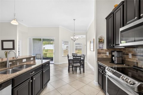 House in Mount Dora, Florida 4 bedrooms, 225.75 sq.m. № 2199441 - photo 9