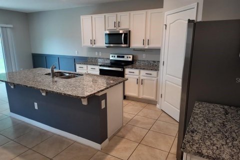 House in Zellwood, Florida 5 bedrooms, 243.96 sq.m. № 2277414 - photo 6