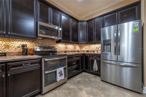 House in The Villages, Florida 4 bedrooms, 256.32 sq.m. № 2408711 - photo 14