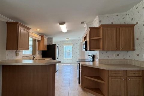 Снять в аренду виллу или дом в Хейнс-Сити, Флорида 3 спальни, 124.86м2, № 2091495 - фото 9
