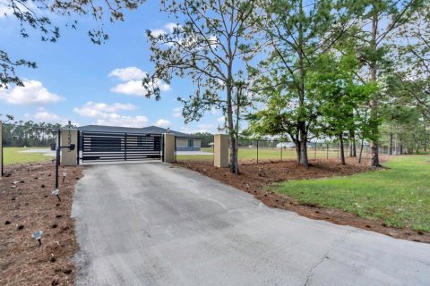 House in Polk City, Florida 4 bedrooms, 295.34 sq.m. № 1574174 - photo 3