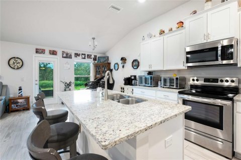 Casa en venta en Dade City, Florida, 4 dormitorios, 187.38 m2 № 1918159 - foto 9