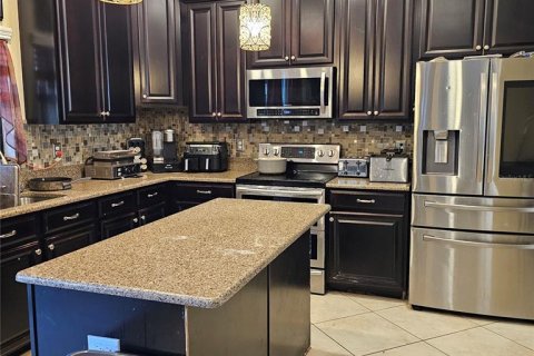 House in Davenport, Florida 5 bedrooms, 336.58 sq.m. № 1850045 - photo 5