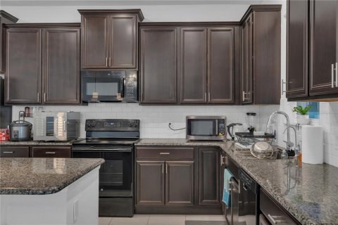 House in Kissimmee, Florida 5 bedrooms, 262.91 sq.m. № 1688414 - photo 30
