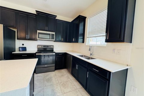 Townhouse in Kissimmee, Florida 4 bedrooms, 182 sq.m. № 2277641 - photo 9