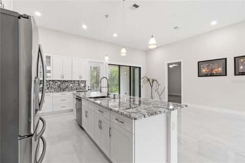 House in Palm Coast, Florida 4 bedrooms, 201.6 sq.m. № 1907706 - photo 13