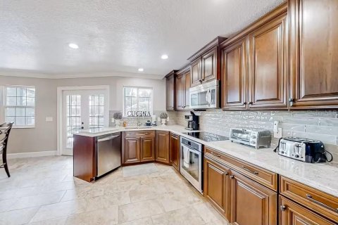 House in Palm Coast, Florida 5 bedrooms, 309.18 sq.m. № 1906822 - photo 7