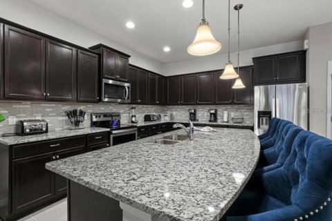 House in Kissimmee, Florida 9 bedrooms, 407.93 sq.m. № 1723152 - photo 12