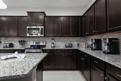 House in Kissimmee, Florida 9 bedrooms, 407.93 sq.m. № 1723152 - photo 11