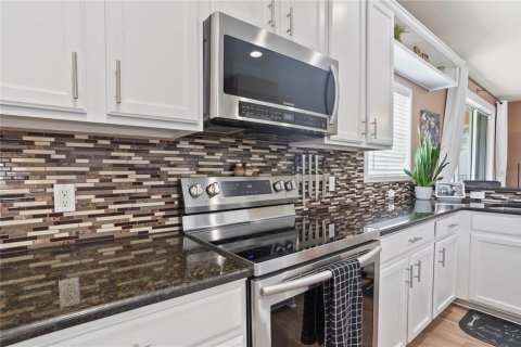 Casa en venta en Land O' Lakes, Florida, 4 dormitorios, 230.58 m2 № 1893913 - foto 12