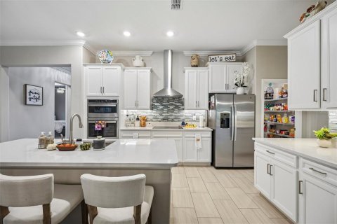 House in Land O' Lakes, Florida 3 bedrooms, 242.66 sq.m. № 2403643 - photo 2