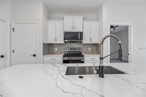 House in Palm Coast, Florida 4 bedrooms, 167.22 sq.m. № 1777299 - photo 13