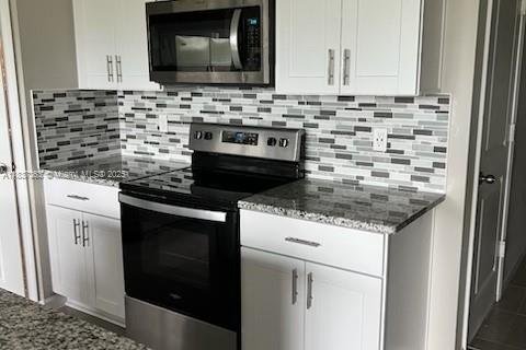 Купить виллу или дом в Уэст-Палм-Бич, Флорида 3 спальни, 139.17м2, № 1973515 - фото 12