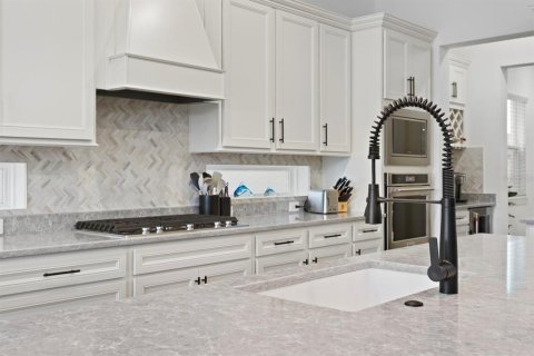 House in Land O' Lakes, Florida 5 bedrooms, 396.88 sq.m. № 1786103 - photo 13