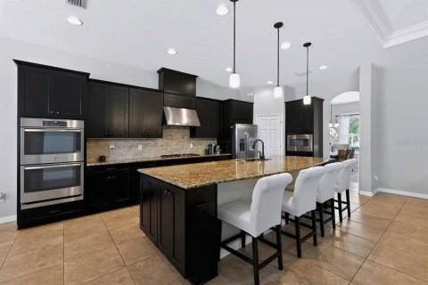 House in CONNERTON

 in Land O' Lakes, Florida 4 bedrooms, 313.82 sq.m. № 2351777 - photo 14