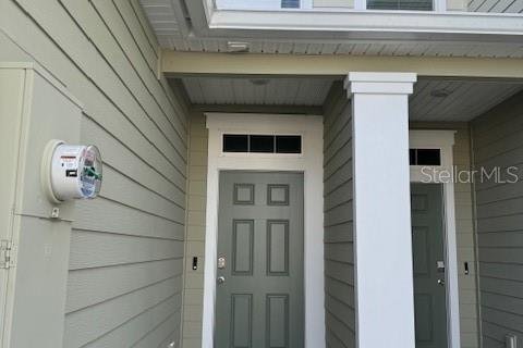 Снять в аренду таунхаус в Палм-Кост, Флорида 3 комнаты, 164.62м2, № 1552630 - фото 1