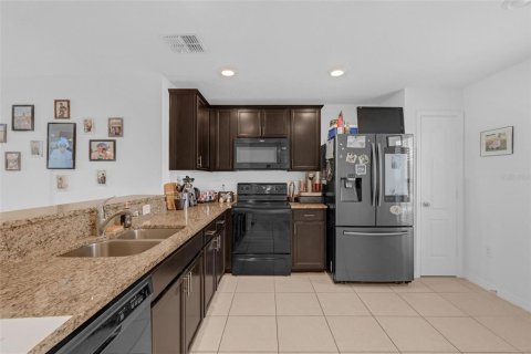 House in Poinciana, Florida 3 bedrooms, 117.43 sq.m. № 1907235 - photo 4