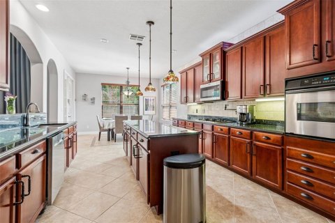 House in Land O' Lakes, Florida 6 bedrooms, 399.48 sq.m. № 2130971 - photo 27