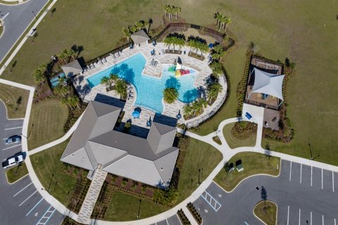 House in TRINITY LAKES in Groveland, Florida 4 bedrooms, 270.44 sq.m. № 1515943 - photo 12