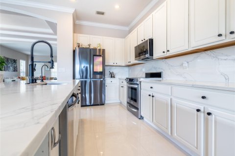 Снять в аренду виллу или дом в Пемброк-Пайнс, Флорида 4 спальни, 221.2м2, № 2045808 - фото 9