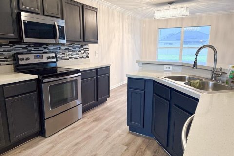 House in Kissimmee, Florida 5 bedrooms, 250.74 sq.m. № 1913087 - photo 8