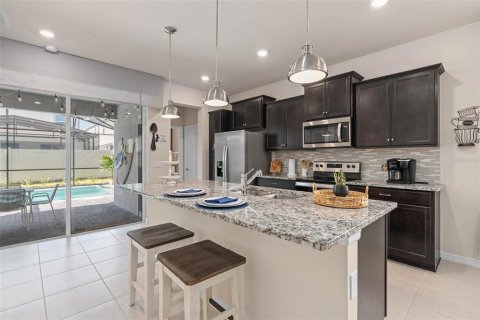 House in Davenport, Florida 5 bedrooms, 243.59 sq.m. № 2391556 - photo 15