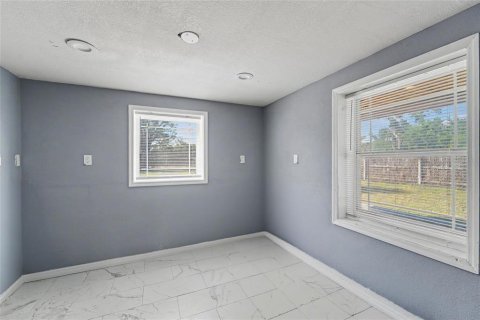 House in Port Richey, Florida 4 bedrooms, 111.48 sq.m. № 2386640 - photo 9