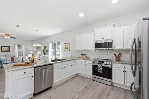 House in Land O' Lakes, Florida 6 bedrooms, 314.57 sq.m. № 2314609 - photo 8