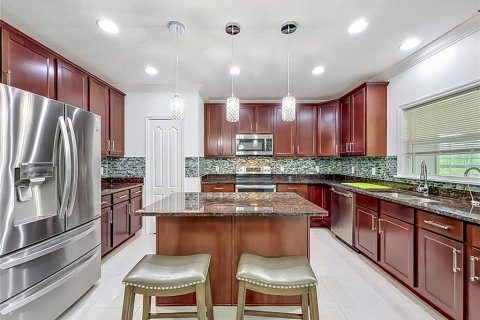 House in Mascotte, Florida 5 bedrooms, 277.78 sq.m. № 2212987 - photo 28