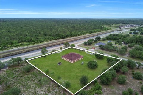 Купить виллу или дом в Клуистон, Флорида 5 спален, 434.78м2, № 1977636 - фото 11