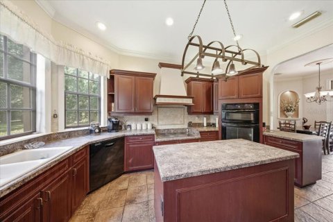House in Polk City, Florida 4 bedrooms, 411.19 sq.m. № 2430793 - photo 13