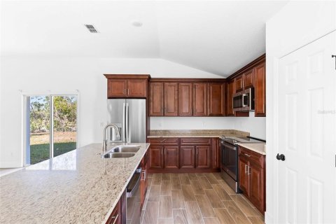 House in Palm Coast, Florida 4 bedrooms, 137.5 sq.m. № 1900458 - photo 5