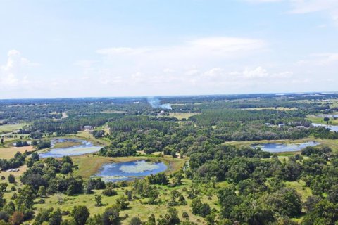 Купить виллу или дом в Хоуи-ин-Хиллз, Флорида 5 комнат, 260.13м2, № 1851740 - фото 5